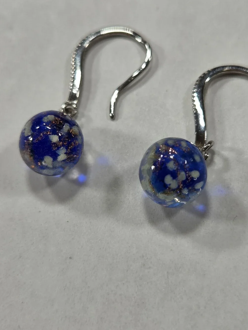 🆕️ NOGU Sapphire .925 Sterling Silver Firefly Glass Huggie Earrings